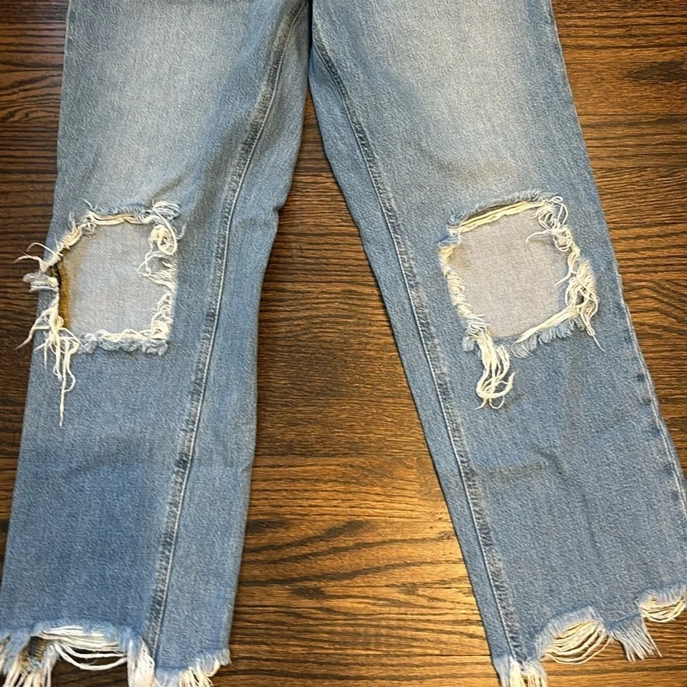 Free People jeans Maggie straight leg with big knee rips and raw hem, size 28